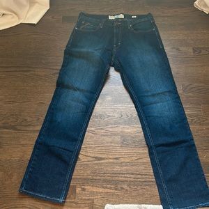 Ariat M7 slim straight jean 34*32  made to wear with your boots.